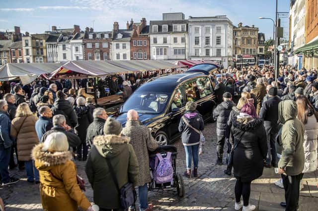 Hundreds gathered in the Market Square on Wednesday morning (December 7) to pay their respects to town legend Eamonn 'Fitzy' Fitzpatrick