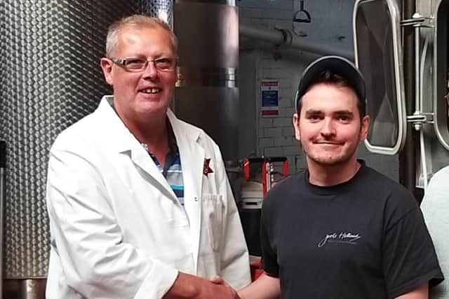 John Smith (left) is passing on the brewing baton and his decades of experience to Ed Garner (right).