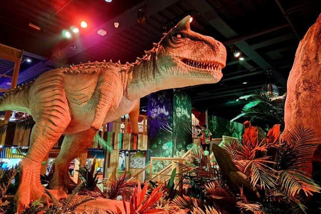 Volcano Falls Adventure Golf features moving dinosaurs