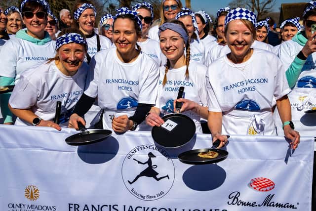 Winners of the Olney Pancake Race - pictured L to R Rebecca Budd & Lupe Morera (joint third) Eloise Kramer (winner) Linda Church (second)