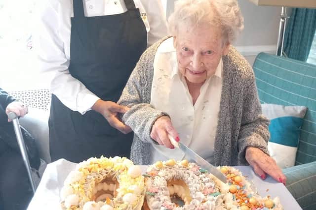 Betty's Cuts into Her Centenary in Style