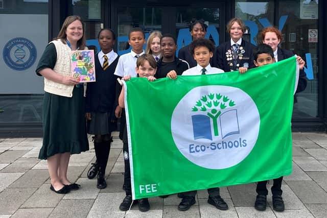 Members of NIA's eco-committee pictured with teacher Miss Penney
