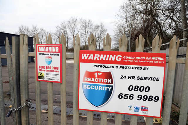 Security is tight at the facility in Wollaston, temporary mortuary