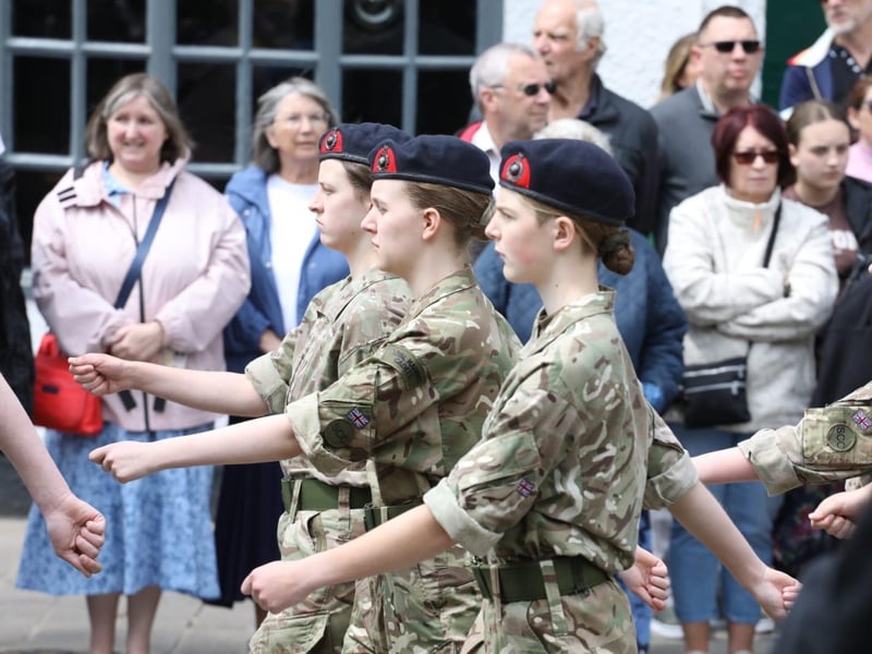 Kettering town centre: crowds line town centre to welcome The Royal Anglian Regiment for Armed Forces Day parade /National World