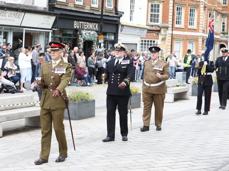 Kettering town centre: crowds line town centre to welcome The Royal Anglian Regiment for Armed Forces Day parade /National World