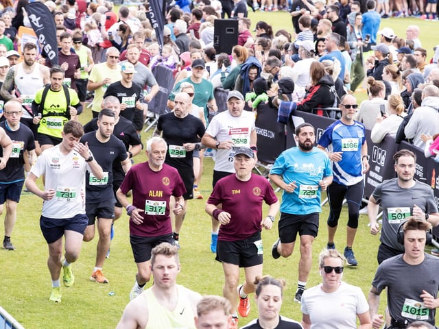Hundreds of runners braved showers and wind to take on the race on Sunday (May 25), which started and finished at Sixfields stadium.
