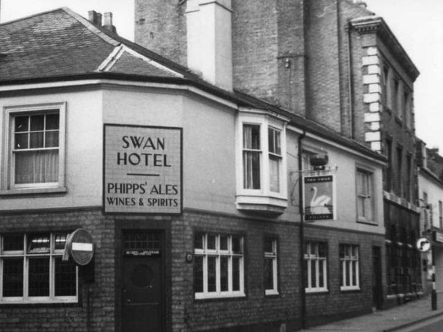 The Swan Hotel was listed as a 16th or 17thCentury pub. That the Swan is old, there is no doubt, but how old? It was not listed as an Ancient Inn in 1585, so if it was about then, it was not anywhere near the stature it was later to become. There is no mention of it in the records from the 1675 Fire, of it being either burnt down or rebuilt, which is slightly strange, not every building was recorded but many of any significance were mentioned. I’m pretty certain that the Swan was first built after the fire, but on a big enough scale to make it instantly one of the bigger Inns in the town. t would have been the natural place to stay for people bringing goods to Northampton for market days as it was the first port of call when entering the town from the eastern Town Gate.  It was renamed as the Mailcoach in the 1970’s and was one of my favourite town pubs in the 1980’s. Still a good pub.
