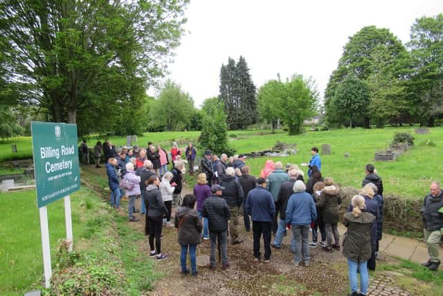 Elaine Johnson, chair of the Northamptonshire Gardens Trust, briefs supporters about the heritage and wildlife at the Billing Road Cemetery.                      
