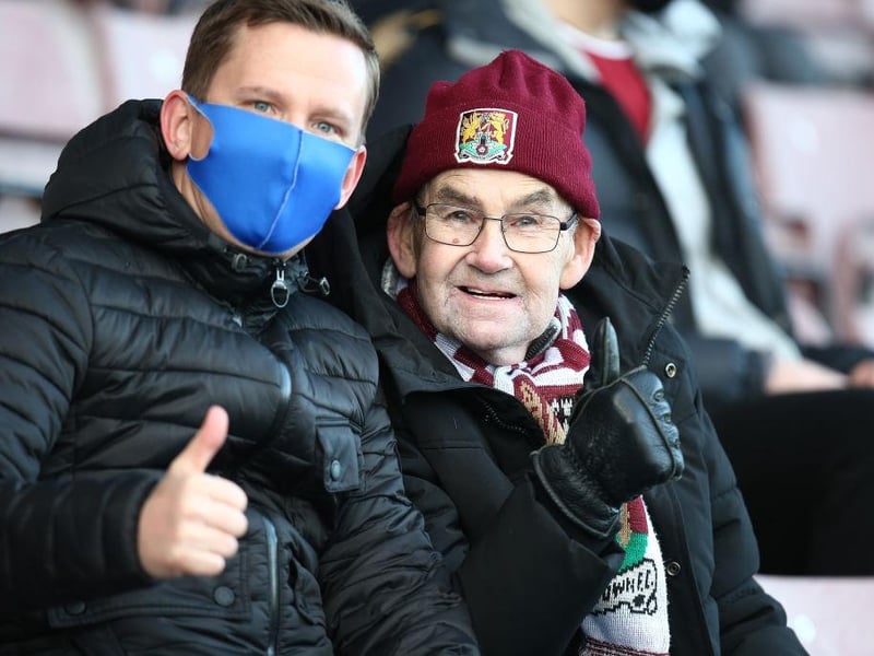Northampton Town fans return to watch their team for the first game since 07.03.20 due to the coronavirus pandemic during the Sky Bet League One match between Northampton Town and Doncaster Rovers at PTS Academy Stadium on December 05, 2020.
