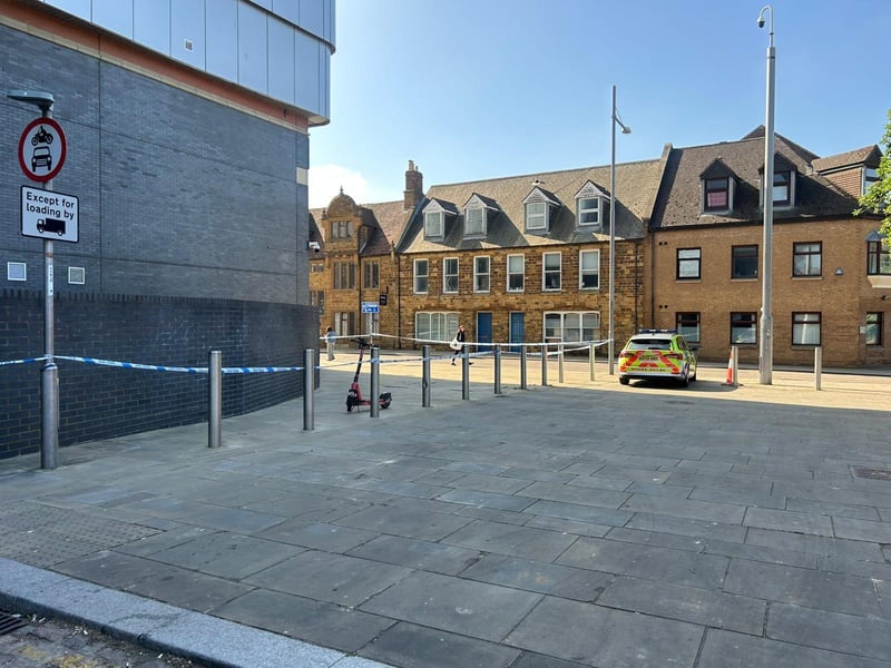 Part of Mare Fair is cordoned off by police.