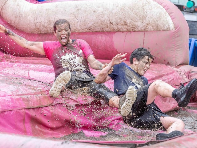 All smiles as participants tackled obstacles during Race for Life's Pretty Muddy on Saturday July 13, 2024 in Abington Park.