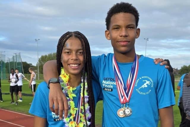 R&N athletes Taya Young and Cairo Cruz show off their medals
