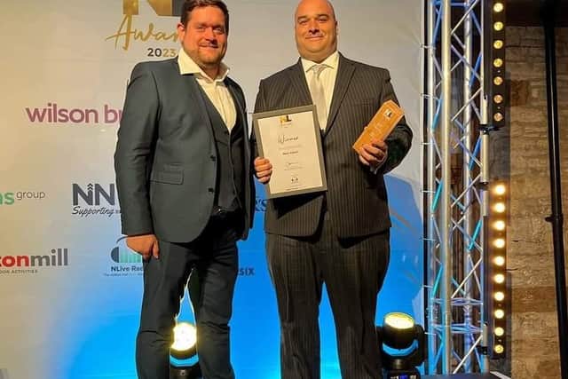 Award presented to Tim Randle by Martin Steers of NLive Radio