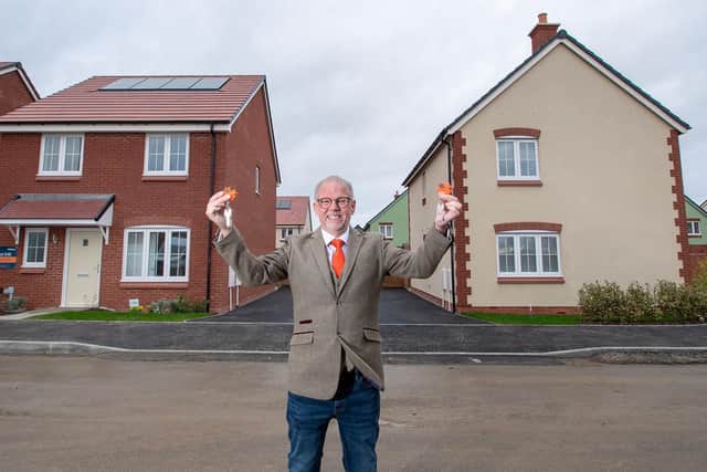 John Lewis pictured outside both of his properties at Weavers Fields