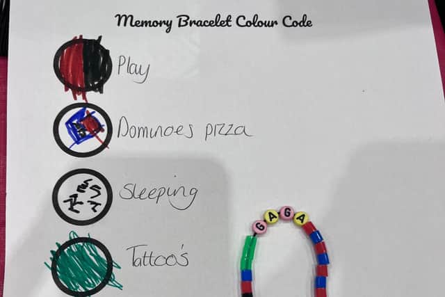 An example of a memory bracelet made by R - aged 6. In memory of his grandad.