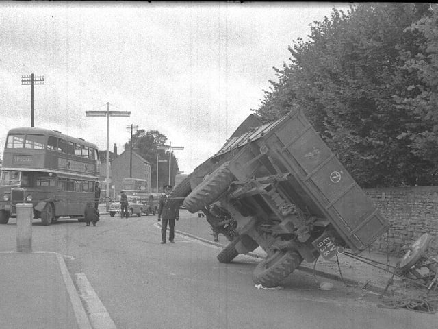 Overturned lorry winched back on its wheels in Welford Road, Northampton, mid-1960s