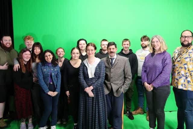 Group photo of actors, students and staff at the University of Northampton.