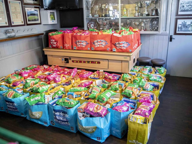 1,700 food parcels were given to more than 70 schools across the county to mark the charity’s third anniversary.