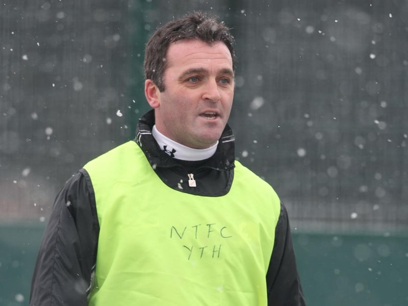 Northampton Town youth coach Eddie McGoldrick looks on as snow falls during a training session at Goals Soccer Centre on February 2, 2009 in Northampton. (Photo by Pete Norton/Getty Images)