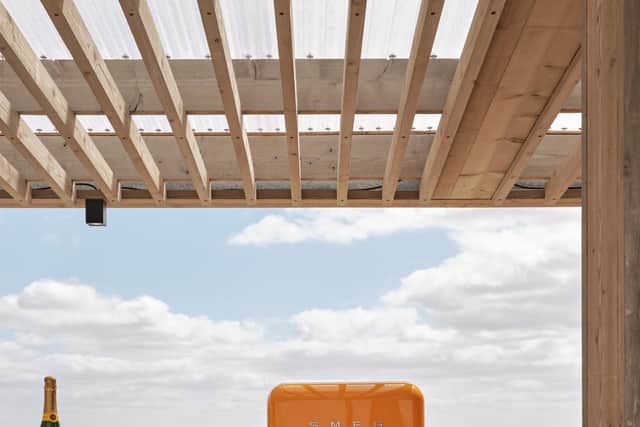 Veuve Clicquot Roof Deck above the restaurant offering the ultimate panoramic views of the track