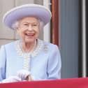 Queen Elizabeth II watches from the balcony of Buckingham Palace during the Trooping the Colour parade the Trooping the Colour parade on June 2, 2022 (Photo by Jonathan Brady - WPA Pool/Getty Images)