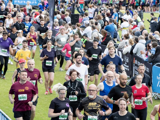Hundreds of runners braved showers and wind to take on the race on Sunday (May 25), which started and finished at Sixfields stadium.