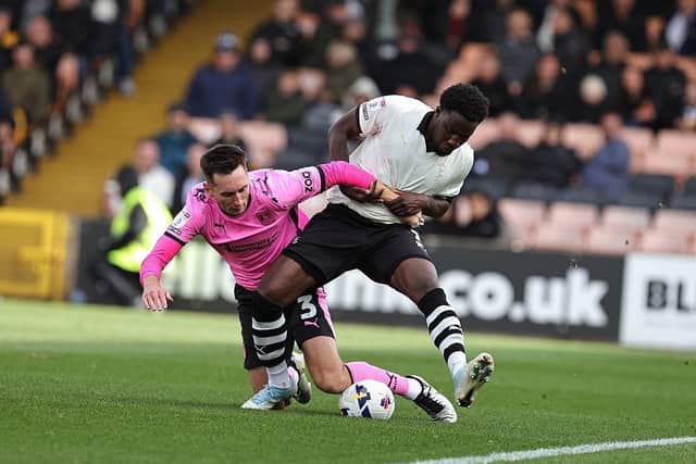 Conor McCarthy and Jaheim Headley battle for possession. (Photo by Pete Norton/Getty Images)