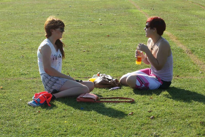 Students from The University of Northampton Bianca Perry and Joanne Adlam, enjoying the autumn sunshine on the Racecourse in 2011.