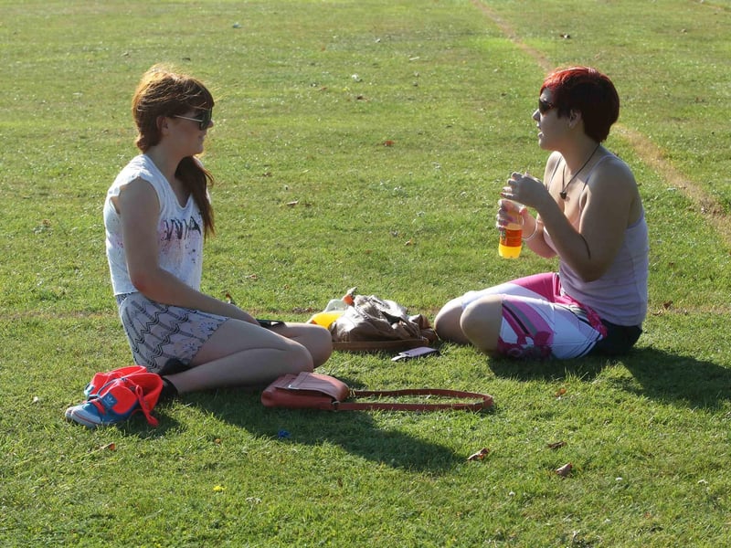 Students from The University of Northampton Bianca Perry and Joanne Adlam, enjoying the autumn sunshine on the Racecourse in 2011.