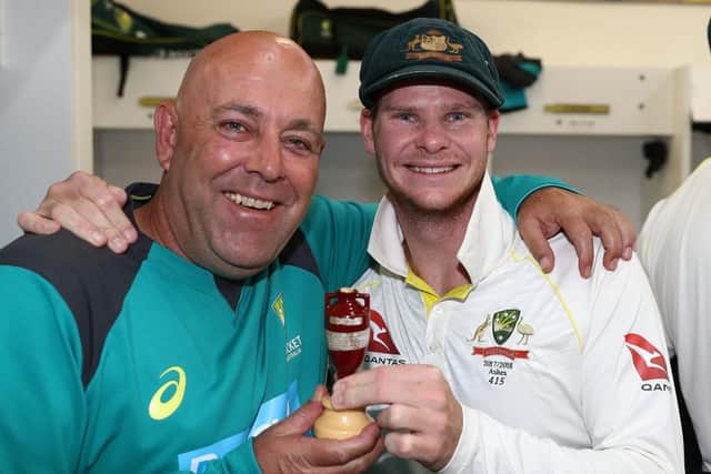 Darren Lehmann celebrates Australia's 2017/18 Ashes win over England with Steve Smith