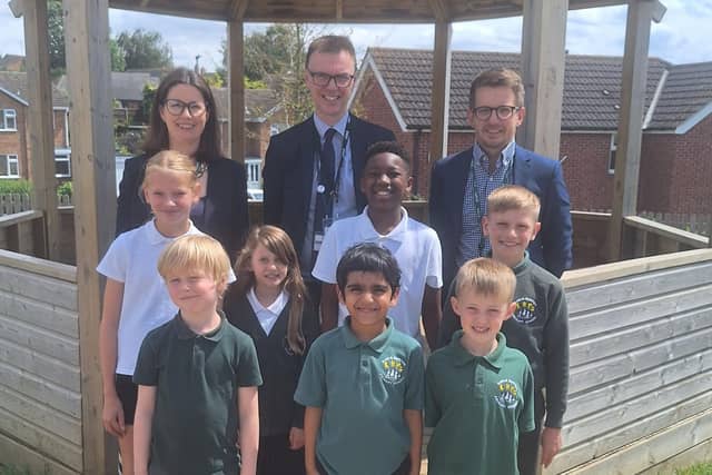 CEO of Hatton Academies Trust, Rob Hardcastle with Co-Headteachers Marie Lally and Ben Morris with students at Earls Barton Primary School