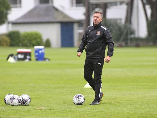 Jon Brady oversees training at St Andrews on Tuesday