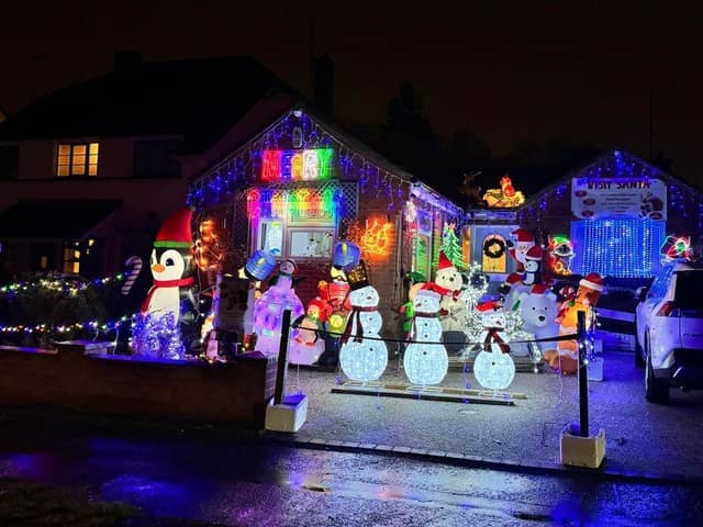 Ann Williams has been decorating the inside and outside of her bungalow in Lumbertubs Lane for a decade, raising money for different charities. Photo: Chris Flavin-Sweeney.