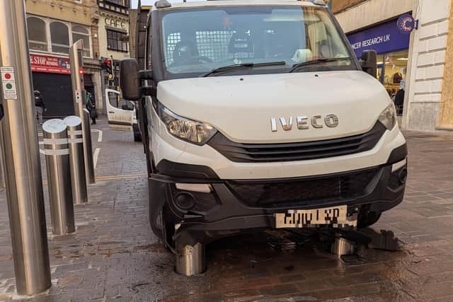 A van driver is calling for better signage after crashing his vehicle into bollards designed to prevent terrorism at Northampton’s Market Square.
