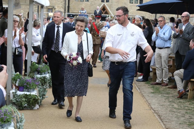 The Princess Royal was shown around the site by Jack Pishhorn