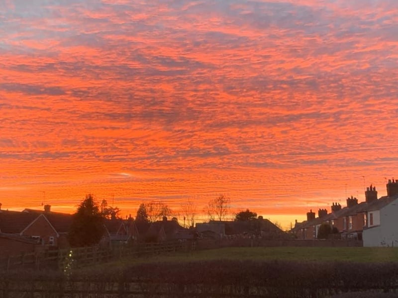 Harpole looking pretty beneath a colourful sky.