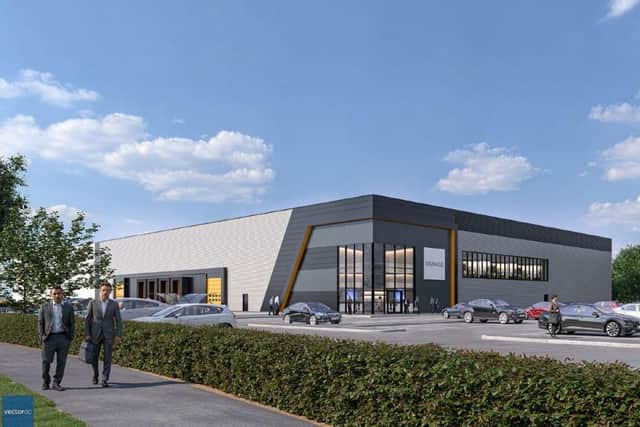 Here's a CGI of the scheme, which includes three units of varying sizes, combining warehouse space with first-floor offices, along with 355 parking spaces, cycle storage and electric vehicle charging points.