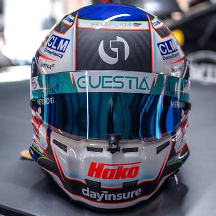Árón Taylor-Smith's helmet with Guestia branding