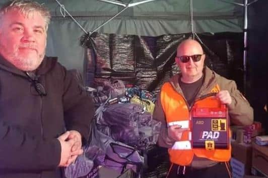 Chris and Graham with medical supplies for refugees.