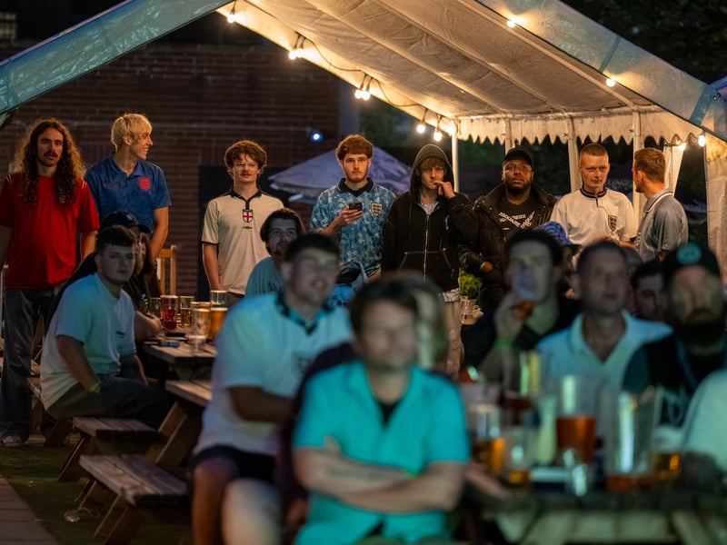Football fans watching England vs Mexico in the garden of The Black Prince in Northampton. Photo by David Jackson.