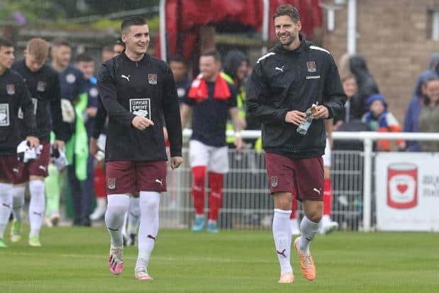 Aaron McGowan (left) and Jon Guthrie both returned to action for the Cobblers at Brackley Town on Saturday (Picture: Pete Norton/Getty Images)