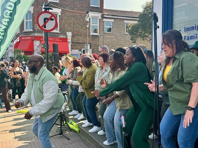 Northants Sings Out perform for runners at the Barnardo's cheer station at the London Marathon