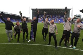 Jon Brady, Colin Calderwood and the rest of Town's coaching staff celebrate promotion