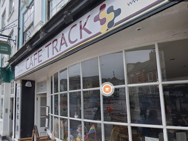18 Market Sq, Northampton NN1 2DL. Rated 4.8/5 from 86 Google reviews. One reviewer said: "CAFE track has an amazing atmosphere the second you walk in and the whole team is friendly and welcoming. This is such an amazing cafe and they deserve all the support."