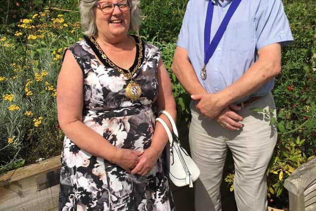 The Mayor of Brackley, Cllr Elaine Wiltshire admiring the garden