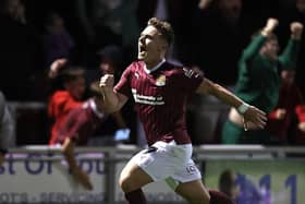 A jubilant Sam Hoskins celebrates his last-gasp equaliser for the Cobblers against Lincoln City at Sixfields on Tuesday night (Picture: Pete Norton)