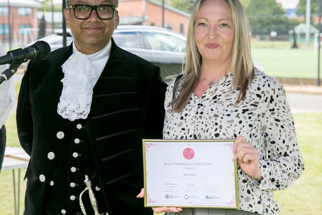 Northamptonshire High Sheriff, Milan Shah MBE, presenting Jane Capps from Off the Streets NN with a Rose of Northamptonshire Award. Volunteer-run community organisation Off the Streets NN have provided over 100 lifesaving bleed kits to communities across the county. The team also provide training on how to stop critical bleeds, run school workshops and distribute amnesty bins, with over 2,000 knives handed in so far.