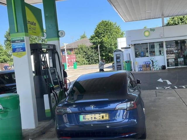 'All pumps being used and this intelligent human parks here to go inside and get some shopping.' 'Typical Tesla driver.'