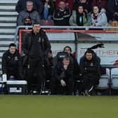 Jon Brady was absent from the touchline as he served a one-game ban, with stand-in assistant Ian Sampson and first-team coach Marc Richards stepping up