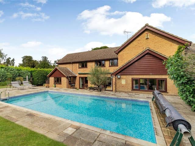 This six-bedroom property comes with plenty of entertaining space as well as an outdoor swimming pool.